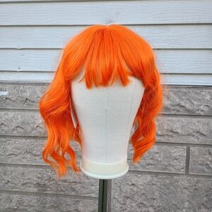 2/$20 Vibrant Orange Curly Hair Wig